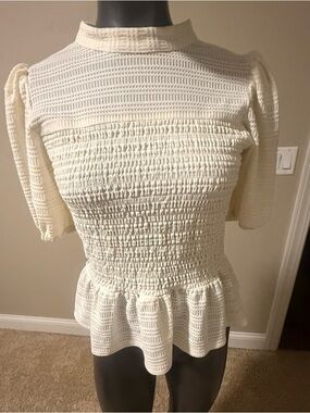 Textured Cream Smocked Peplum Blouse with Short Puff Sleeves